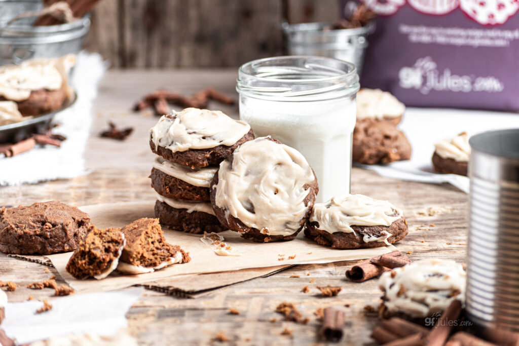 gluten free pumpkin cookies with glaze and milk