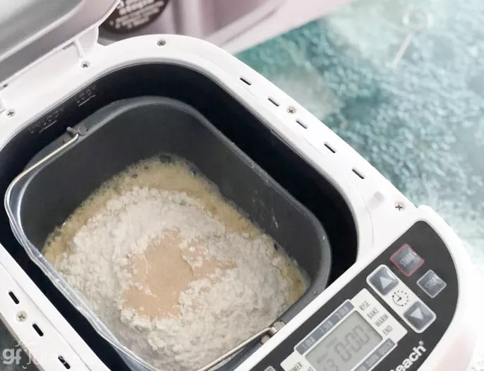 liquids go in first, then dry ingredients, then yeast for all bread machines