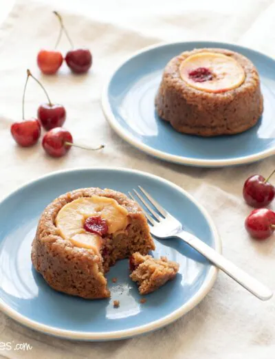 gluten free upside-down apple cakes on blue plates