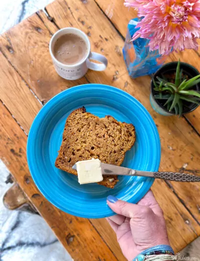 gluten free banana pumpkin bread on place with butter