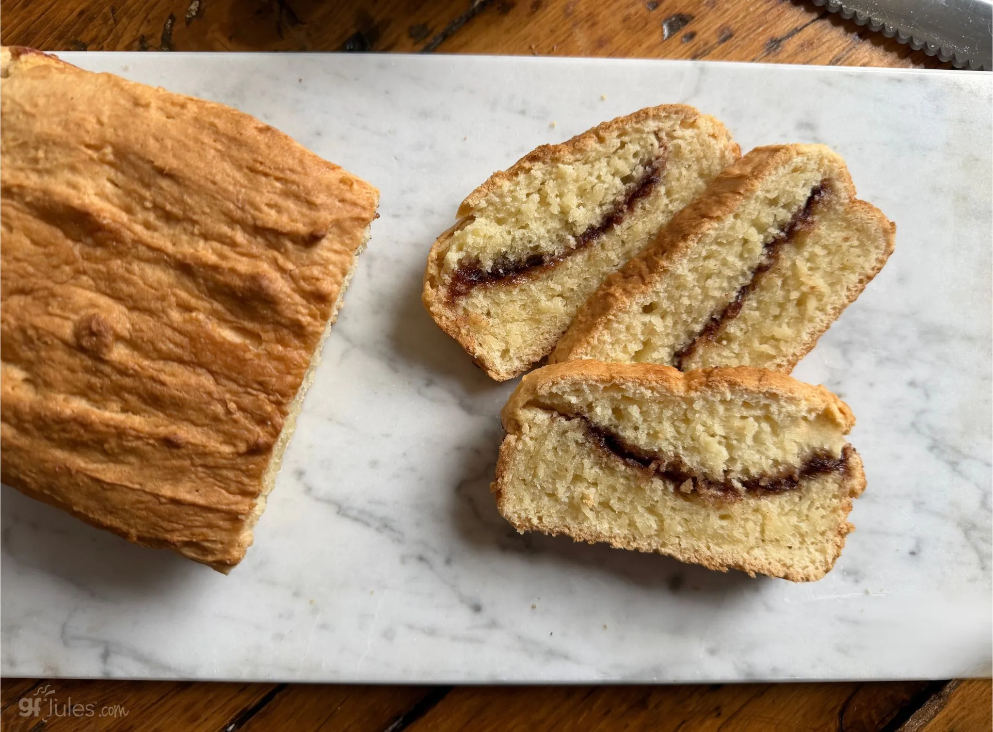 gfjules gluten free cinnamon swirl quick bread on marble board