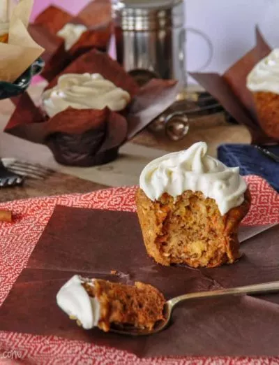 gluten free carrot cupcakes with fork and paper