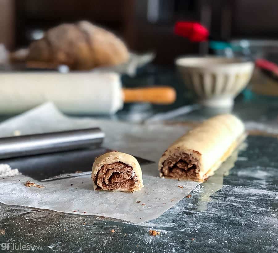 gluten free cinnamon roll cookie dough rolled and sliced