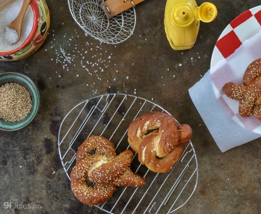 gluten free soft pretzels on rack with mustard