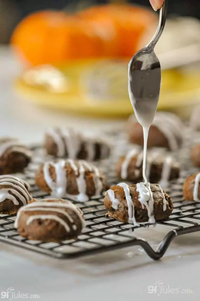 vegan gluten free pumpkin cookies with spoon and glaze | gfJules