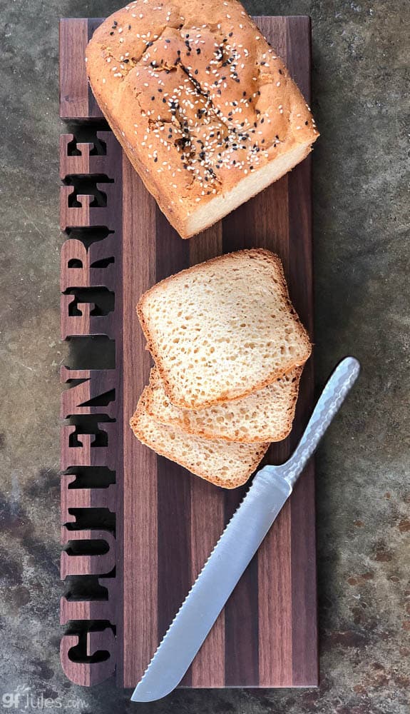 gluten free bread on Words with Boards board with knife