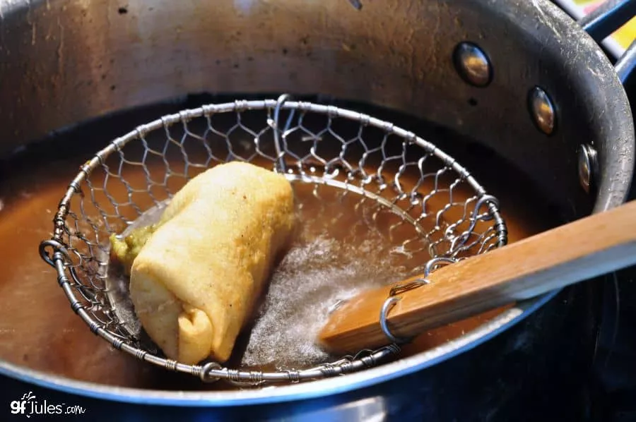 https://gfjules.com/wp-content/uploads/2015/08/gluten-free-egg-roll-in-fryer.jpg