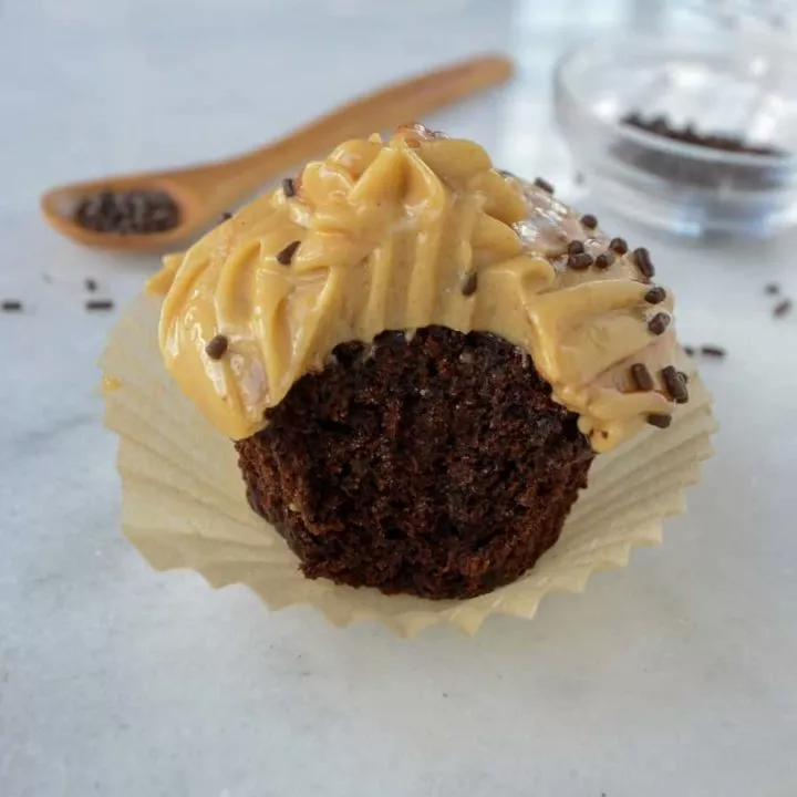 gluten free chocolate cupcake with bite and spoon