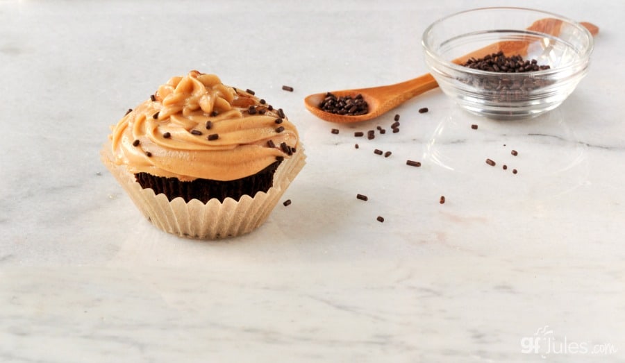 gluten free chocolate cupcake with peanut butter frosting and sprinkles