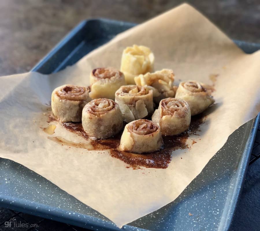 gluten free pie crust cinnamon rolls on parchment