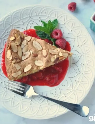 Gluten Free Lemon Almond Cake with mint and berries and fork