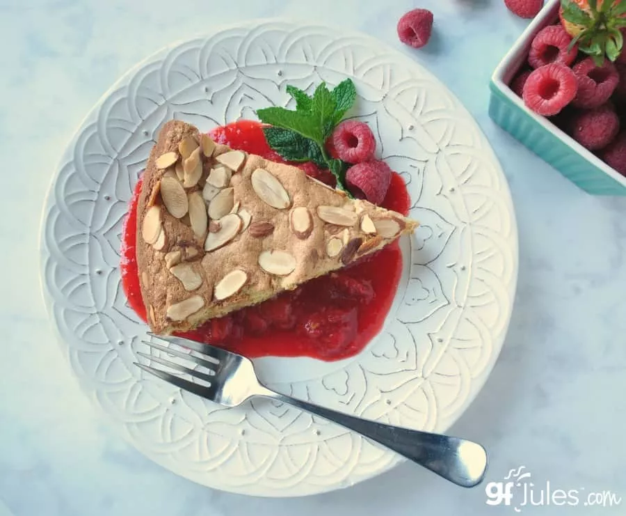 Gluten Free Lemon Almond Cake with mint and berries and fork