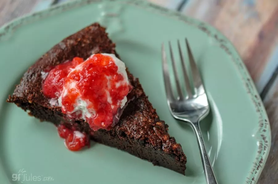 berry coulis on gluten free hot fudge pie