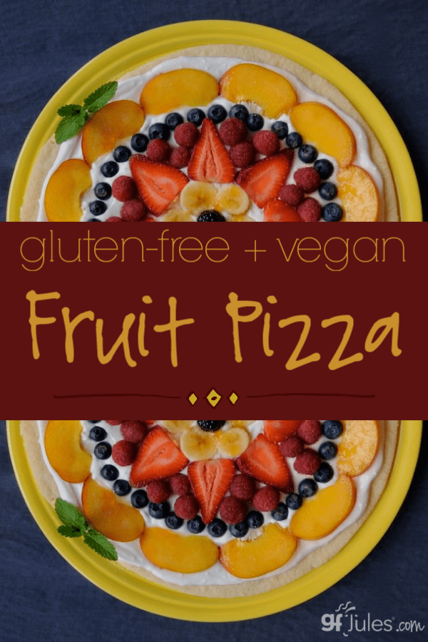 What's not to love about a gluten free Fruit Pizza made of a giant soft gluten free sugar cookie topped with whipped frosting and all your favorite fruits?! By gfJules