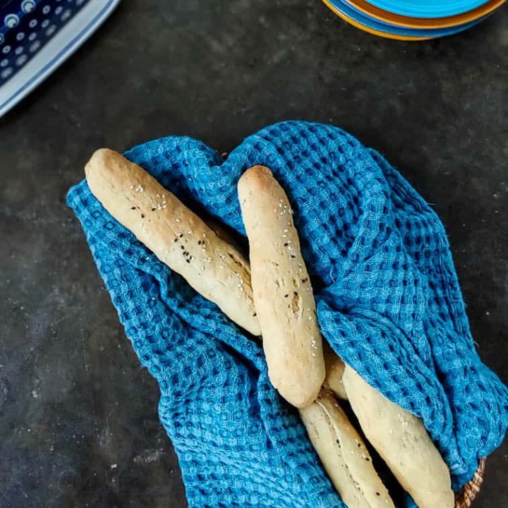gluten free bread sticks in basket overhead