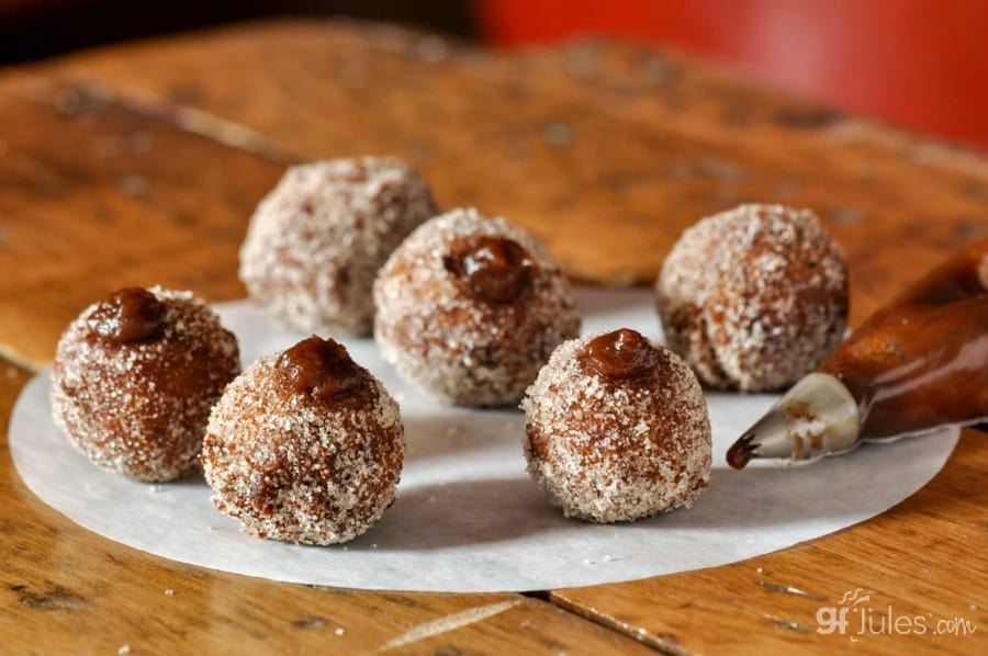 gluten free doughnut hole with piping bag