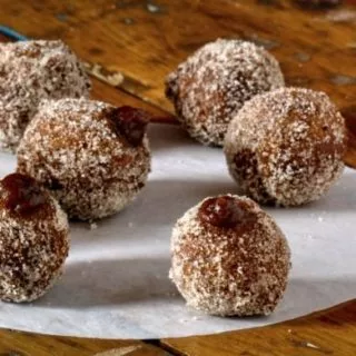 gluten free doughnut holes on paper