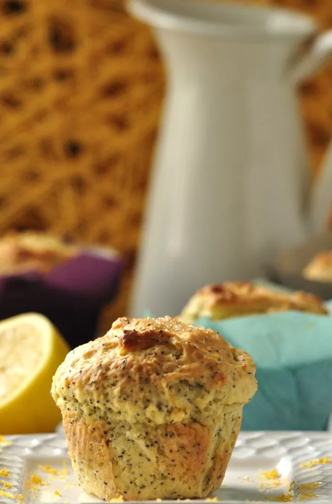 Gluten Free Lemon Poppyseed Muffin with pitcher