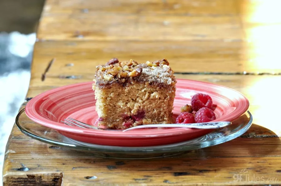 Gluten Free Rhubarb Coffee Cake with berries on table