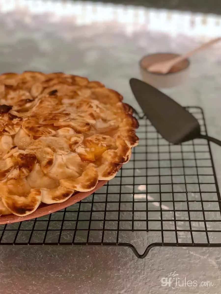 gluten free peach pie on rack