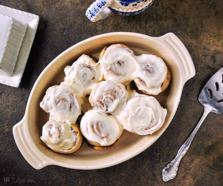 gluten free cinnamon rolls without yeast in pan with server