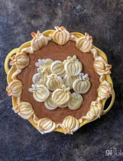 gluten free pumpkin pie with pumpkins