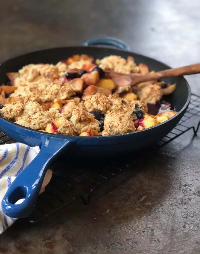 gluten free old fashioned peach cobbler in cast iron