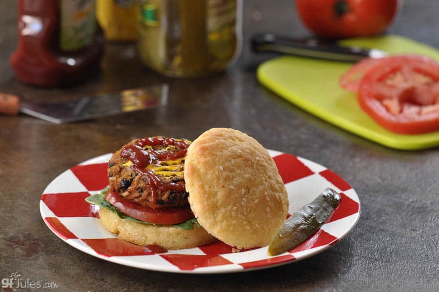 gluten free sweet potato black bean veggie burger on bun with condiments 