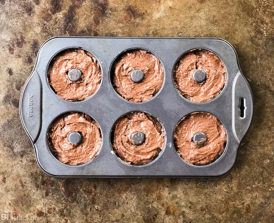 gluten free chocolate donut batter in pan