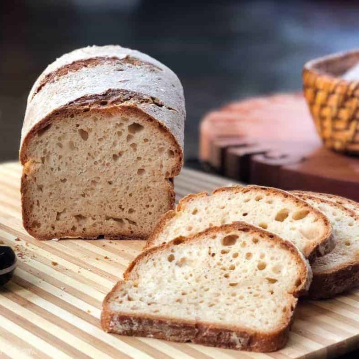 gluten free sourdough dough sliced on board CU