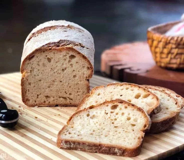 gluten free sourdough dough sliced on board CU