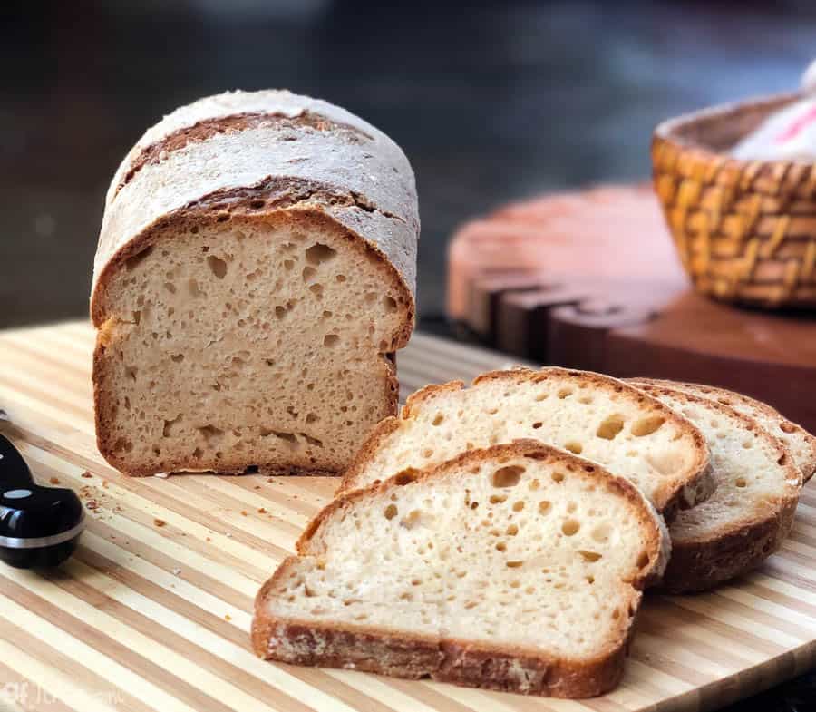 https://gfjules.com/wp-content/uploads/2019/09/gluten-free-sourdough-dough-sliced-on-board-CU.jpg