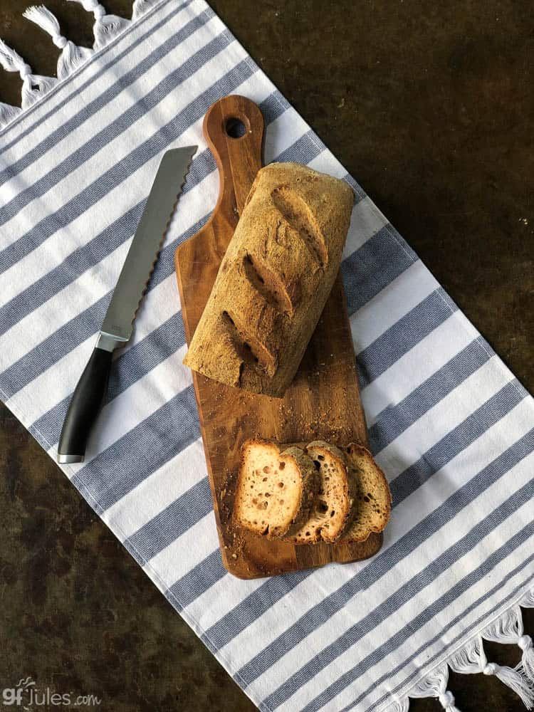 gluten free sourdough sliced on board