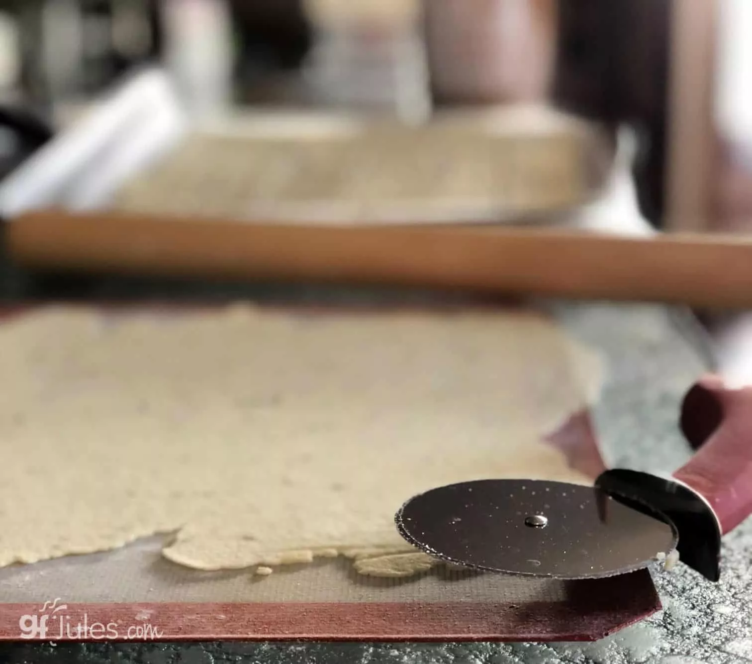 rolling gluten free cracker dough