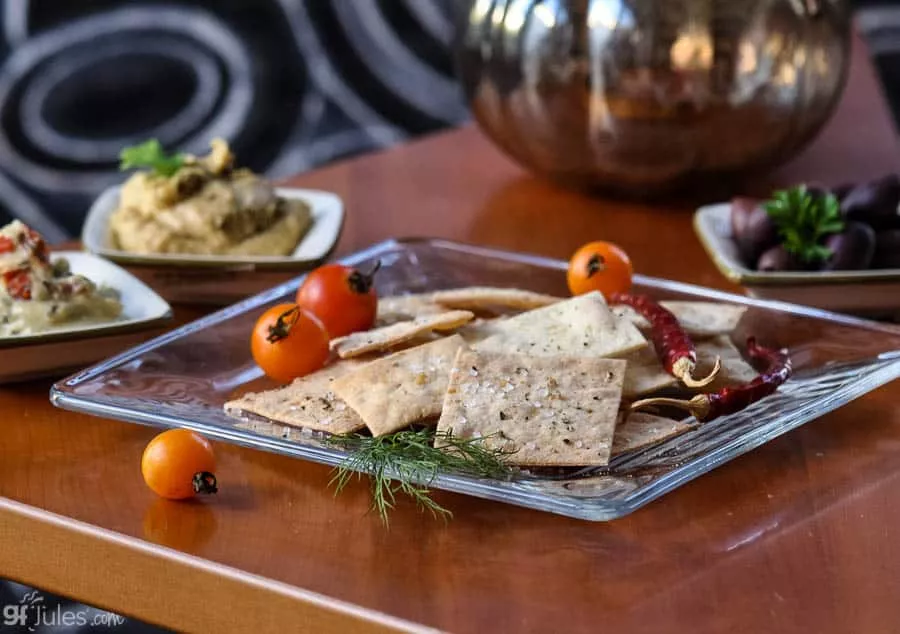 gluten free crackers on glass plate with dill wider