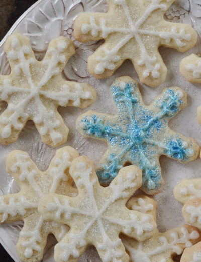 gluten free cut out cookie snowflakes on plate | gfJules_