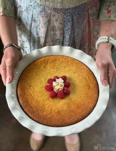Gluten Free Dairy Free Crustless Coconut Pie presented with raspberries on Easter