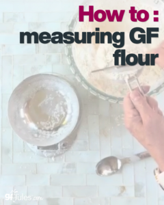 measuring gluten free flour with measuring cup