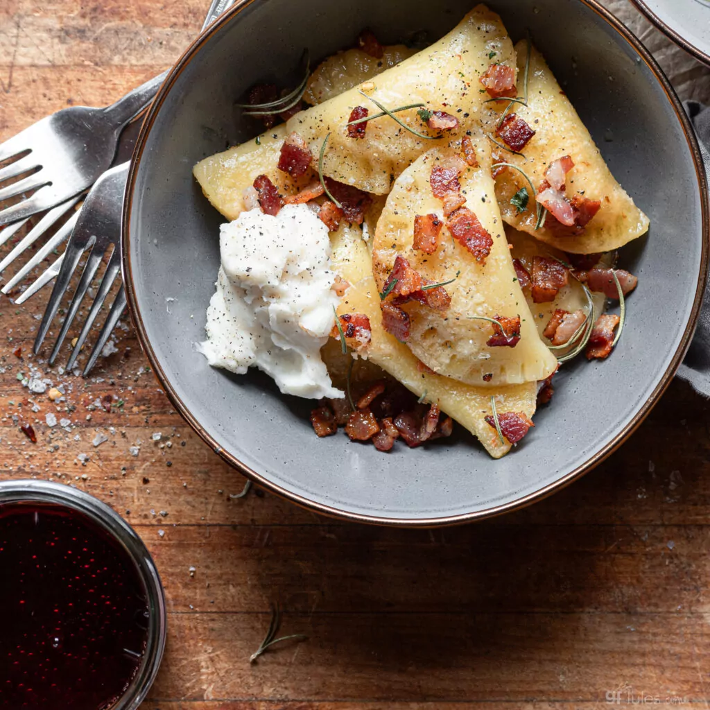 gluten free pierogi in bowl with mashed potatoes