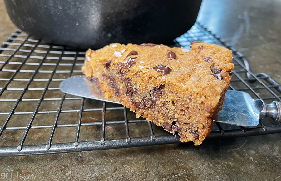 https://gfjules.com/wp-content/uploads/2022/08/gluten-free-skillet-cookie-slice-gfJules.jpg