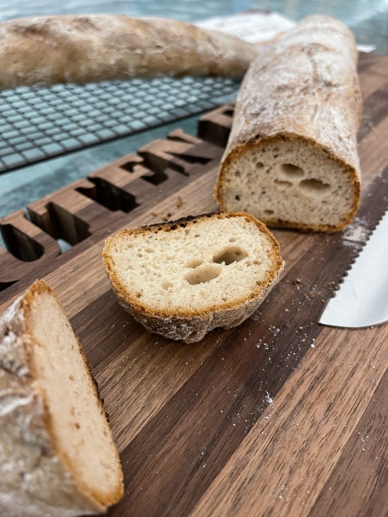 Sliced Gluten Free Baguette on cutting board