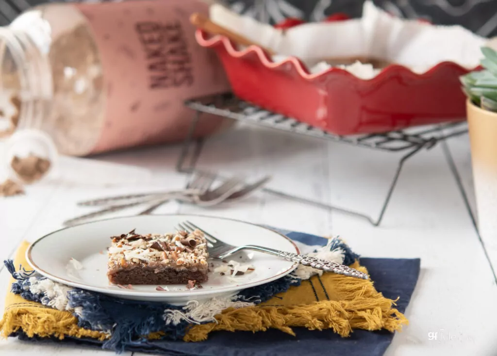 Gluten Free Texas Sheet Cake made with Naked Shake shown in background