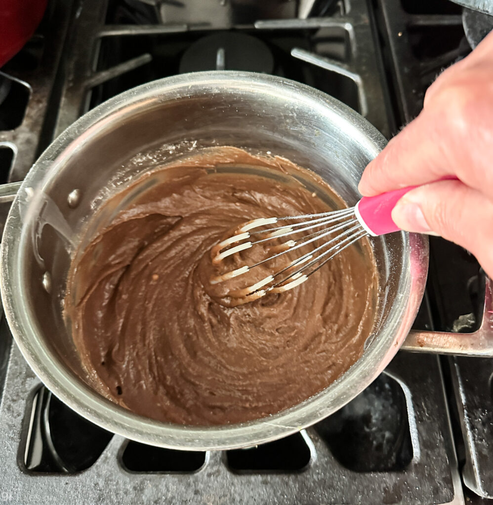 Gluten Free Texas sheet cake stirring in pot