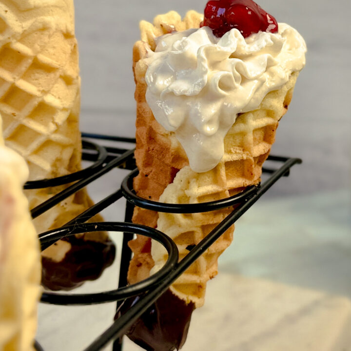 Gluten Free Pie cone with whipped cream and cherry