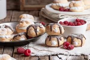 gluten free puff pastries on table with chocolate and without