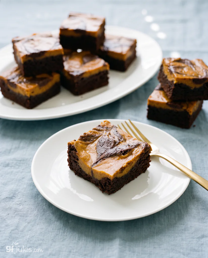 gluten free pumpkin brownies on blue linen