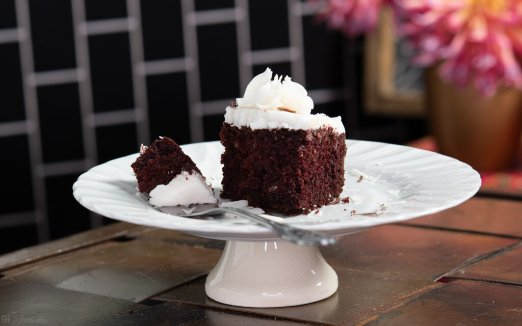 gluten free red velvet slice with bite on fork