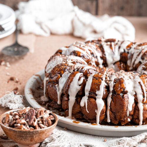 gluten free monkeybread on plate with pecans