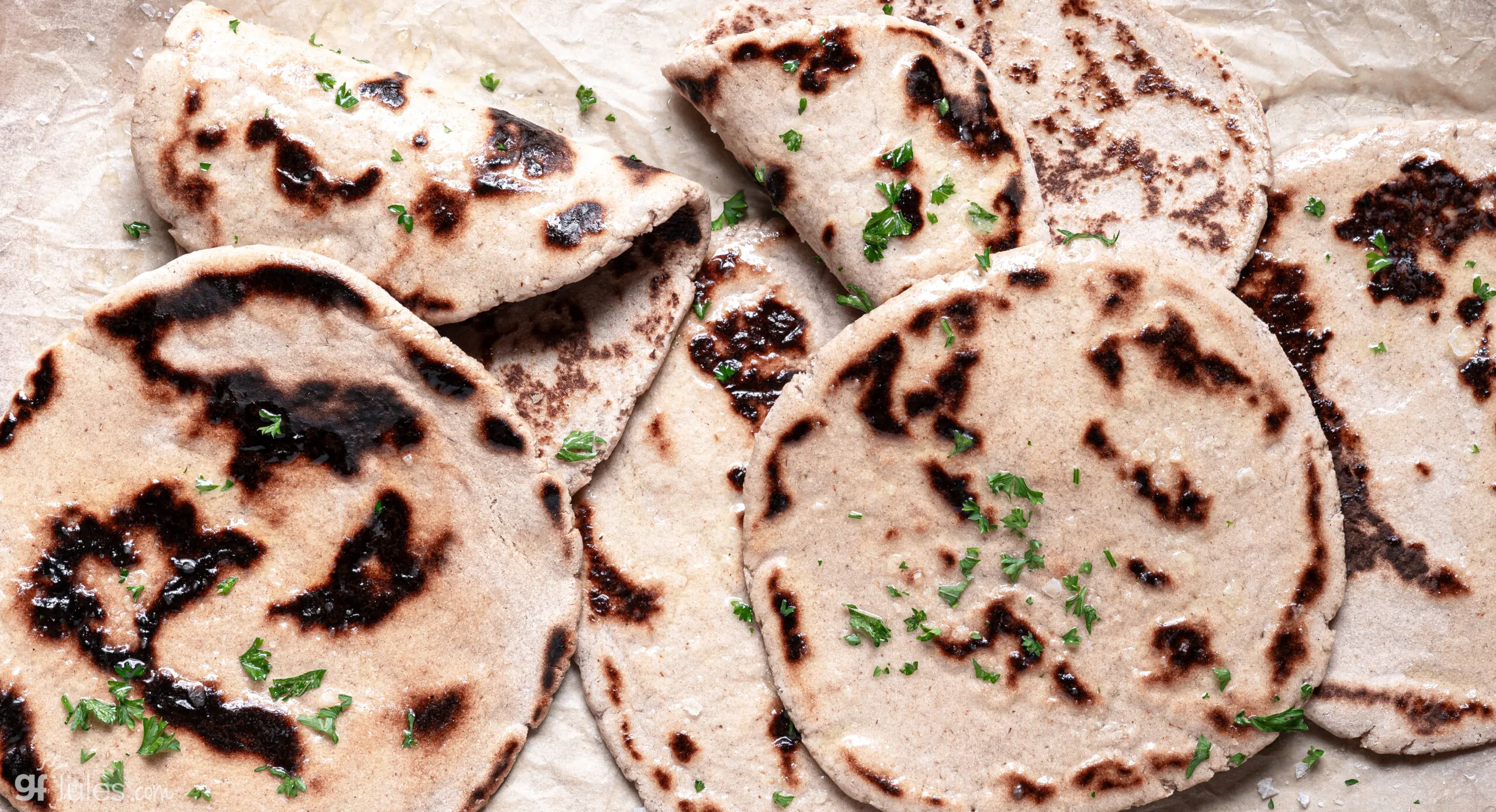 gluten free naan breads spread out on table