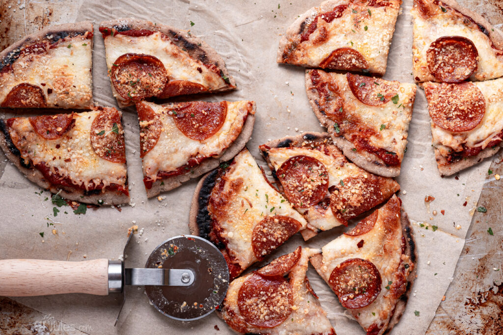 grain-free naan bread pizzas with cutter